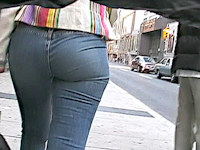 Look how girls should dress to make all men look back at them! Sexy tight jeans that squeeze round girls buttocks and short top!